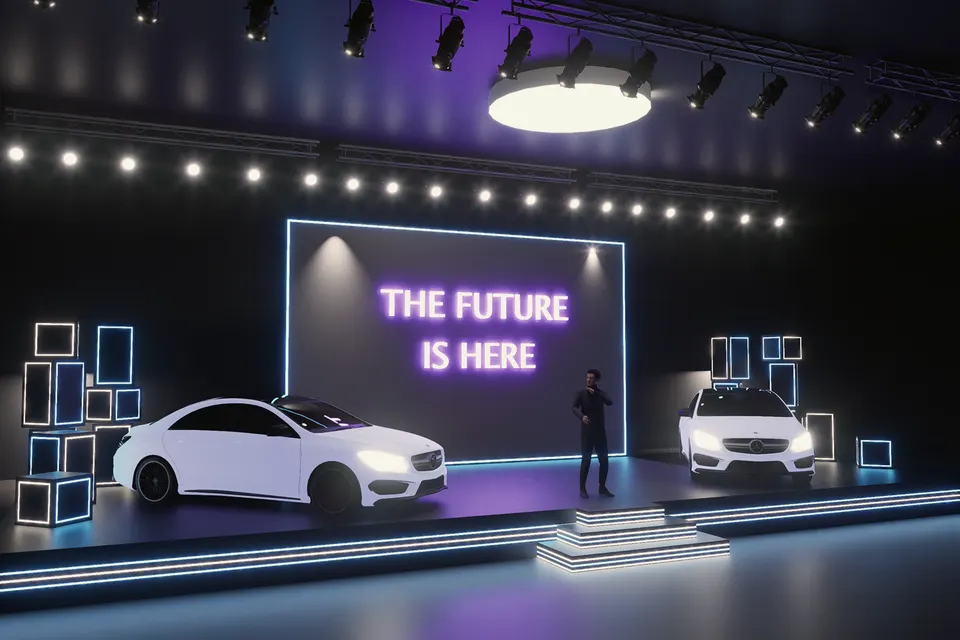 Product launch stage with two cars under a violet light rig
